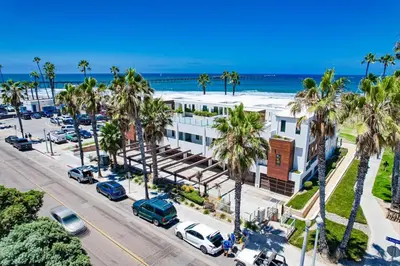an aerial view of a building with palm trees and the beach at Ocean Park 05 in San Diego