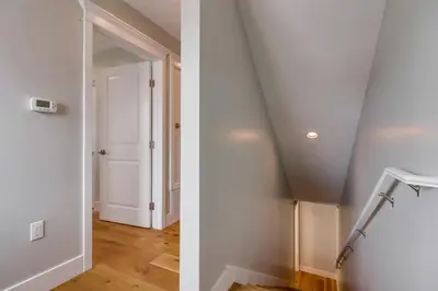 two images of a stairwell with a stair railing and a door at Seaglass Shores in San Diego