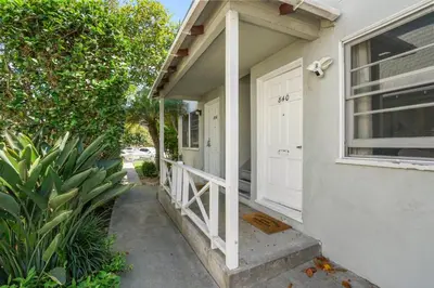 a house with a white door and a porch at 500 ft to Ocean Relaxing stay Parking WiFi 840 in San Diego
