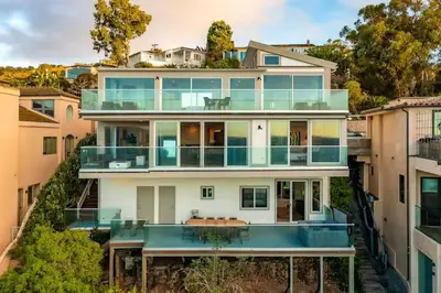 an aerial view of a large white house at Cliffside Haven Where Ocean Meets Sky in San Diego