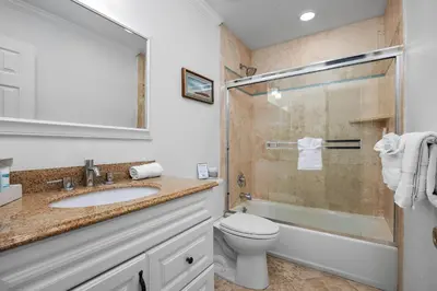 a bathroom with a toilet sink and a shower at Seaside Shenanigans - DMBC751P in Solana Beach