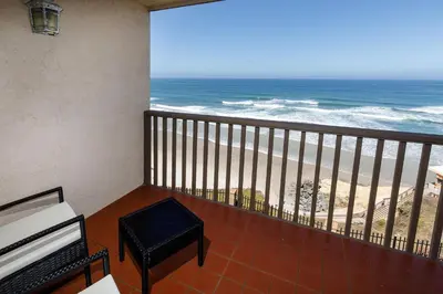 a balcony with a view of the beach at Enjoy Some Sea-clusion-DMST25 in Solana Beach