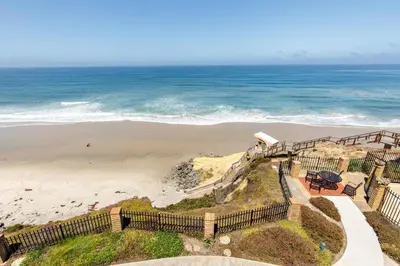 an aerial view of the beach and the ocean at Enjoy Some Sea-clusion-DMST25 in Solana Beach