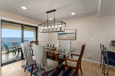 a dining room with a table and chairs at Bella Vista - SUR111 in Solana Beach