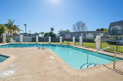 a swimming pool at a apartment complex at Keepin' It Real - SB851VA in Solana Beach