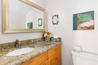 a bathroom with a sink and a mirror at Let the Sea Set you Free SUR35 in Solana Beach