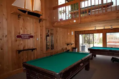 a pool table in a room with wooden walls at Let the Sea Set you Free SUR35 in Solana Beach