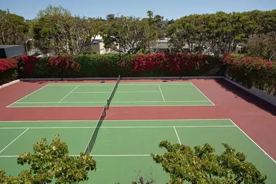 a tennis court with a tennis racket on it at Paradise Awaits - SUR182 in Solana Beach