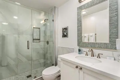 a bathroom with a shower and a toilet and a sink at Relax & Renew - SONG8 in Solana Beach