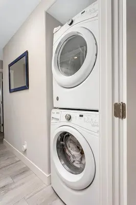 a washing machine and a dryer in a room at Endless Summer - SUR149 in Solana Beach