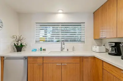 a kitchen with a sink and a window at Don't Worry Beach Happy SONG13 in Solana Beach