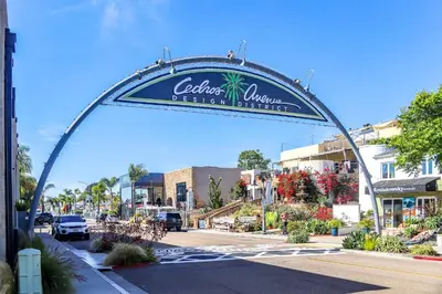 a sign that reads california flower festival distributor at Don't Worry Beach Happy SONG13 in Solana Beach