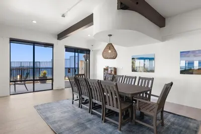 a dining room with a table and chairs at A Shore Thing! - DMST21 in Solana Beach