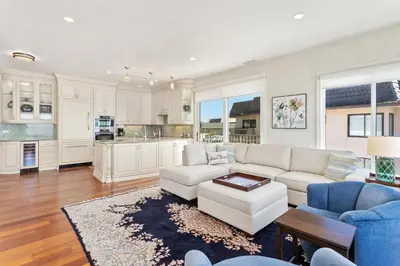 a living room with a couch and a table at Beach View Beauty - DMBC775D in Solana Beach