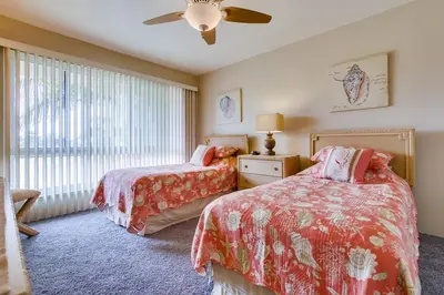 a bedroom with two beds and a ceiling fan at Bare Feet &Salty Hair-DMBC141S in Solana Beach