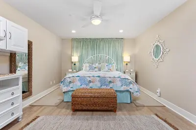 a bedroom with a bed and a window at Beachfront Bliss - DMBC815 in Solana Beach
