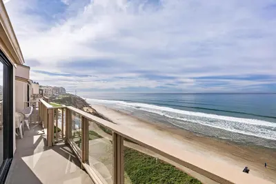 a balcony with a view of the beach at Sea For Miles - SUR93S in Solana Beach