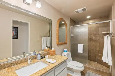 a bathroom with a sink and a toilet and a shower at Sea For Miles - SUR93S in Solana Beach