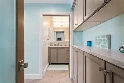 a kitchen with a sink and a counter top at Sea Gem - SBTC119 in Solana Beach