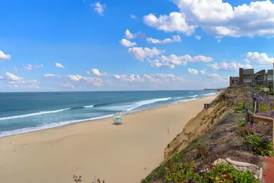 a view of the beach from a bluff at Ocean Whisper - SBTC238 in Solana Beach