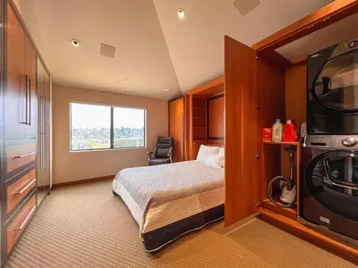 a hotel room with a bed and a television at Enchanting Oasis - SONG72 in Solana Beach