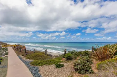 a pathway leading to the beach with the ocean at Aqua Horizon - SBTC112 in Solana Beach