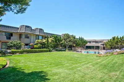 a large yard in front of a house at Beachy Keen & Cleen - DMBC148S in Solana Beach