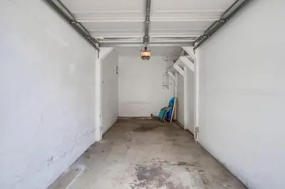 an empty room with a white wall at Manhattan Shores 1A in San Diego