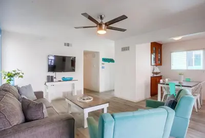 a living room with a couch and a table at Manhattan Shores 5 in San Diego