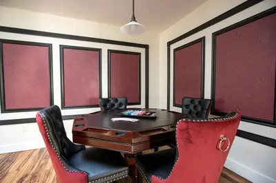 a conference room with a wooden table and red chairs at Poker and Golf Club, Stream movies & Sports in San Diego