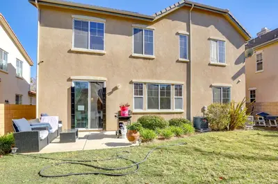 a house with a garden in front of it at 14 Mi to Old Town Temecula Luxe Fallbrook Home! in Fallbrook