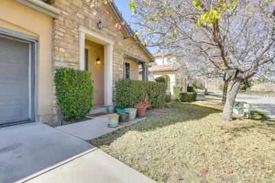 a house with a door and a yard with plants at 14 Mi to Old Town Temecula Luxe Fallbrook Home! in Fallbrook