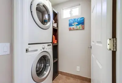 a laundry room with a washer and dryer at Home to enjoy the beach with ocean view in Oceanside