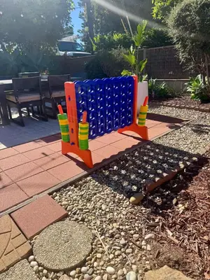 a colorful bench sitting on top of a garden at Carlsbad Beach Bungalow in Carlsbad