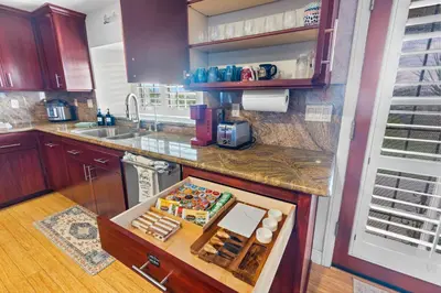 a kitchen with a box of food on a counter at Temecula Valley Private Estate Panoramic Mountain & Pool Views in Murrieta
