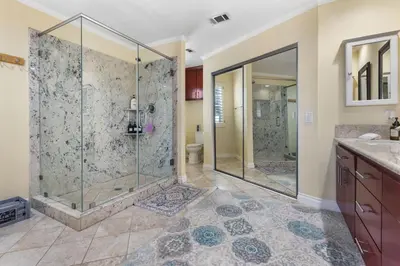 a large bathroom with a shower and a toilet at Temecula Valley Private Estate Panoramic Mountain & Pool Views in Murrieta