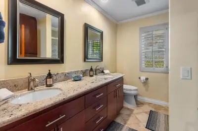 a bathroom with a sink and a toilet at Temecula Valley Private Estate Panoramic Mountain & Pool Views in Murrieta