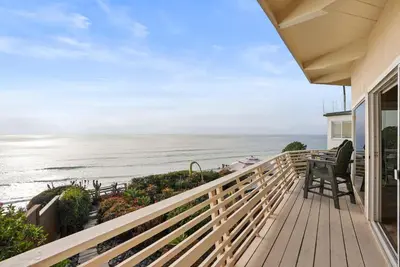 a balcony with a view of the ocean at Oceanfront Paradise on Neptune in Encinitas