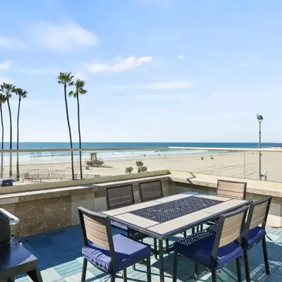 Beachfront Retreat with Ocean Views Private Rooftop Deck Walk to Pier and Town
