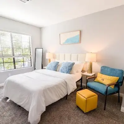 Poolside 2BR Condo with Balcony & Workspace
