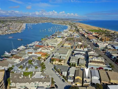 an aerial view of a harbor with boats in the water at Near Beach, Harbor & Ferry Bikes Patio BBQ in Newport Beach