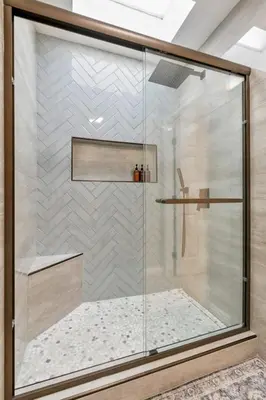 a shower with a glass door in a bathroom at Beachfront Home In Carlsbad - Remodeled in Carlsbad