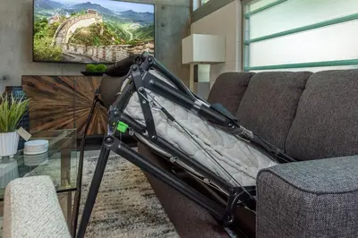 a chair sitting on a couch in a living room at King Size Luxury Loft Petco-Park-Downtown SD in San Diego