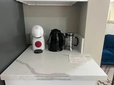 a kitchen counter with a blender and a toaster on it at The Grove Studio at Mt Helix in La Mesa