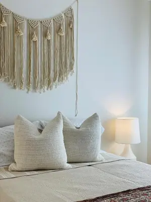 a bedroom with a bed with white pillows at 4Bd Spacious Oasis near wineries in Menifee