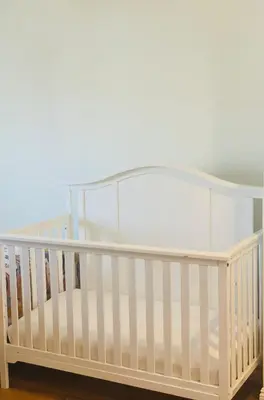 a white crib in a room at 4Bd Spacious Oasis near wineries in Menifee