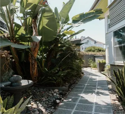 a garden with plants and a stone walkway at Outsite San Diego - Golden Hill in San Diego