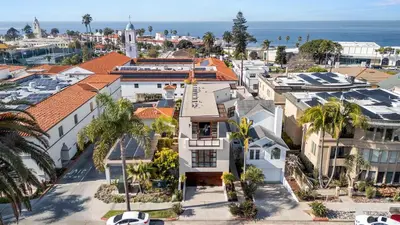 an aerial view of a city with houses at Brand New Listing Elegant 7BR Masterpiece Walk to Beach Shops & Dining in San Diego