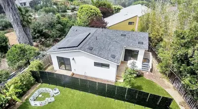 an aerial view of a home with a solar roof at The Quaint Cardiff Hideaway with Pak N Play in Encinitas