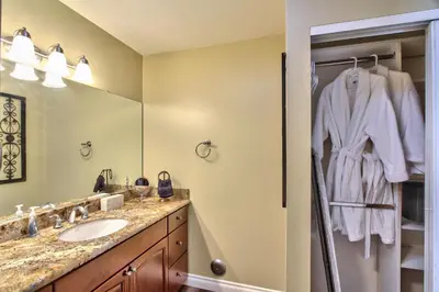 a bathroom with a sink and a mirror at Hutchison Estate, Guest Suite 1 in Murrieta
